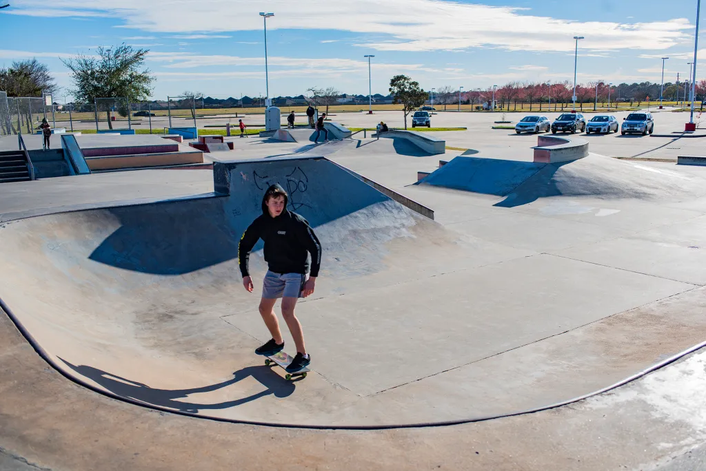a kid skating at the league city skatepark